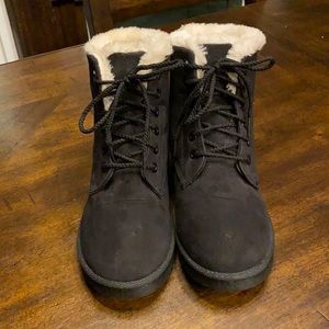 Black faux suede booties with faux fur lining.